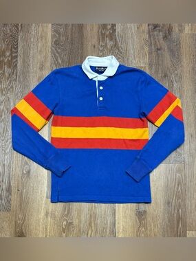 Rowing Blazers Blue Polo with Red Diamond Accent